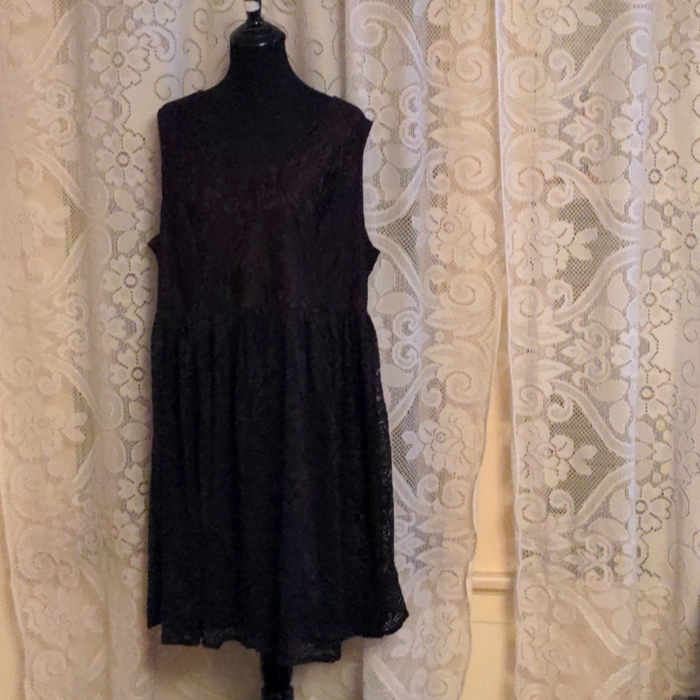Dark purple dress with a black overlay